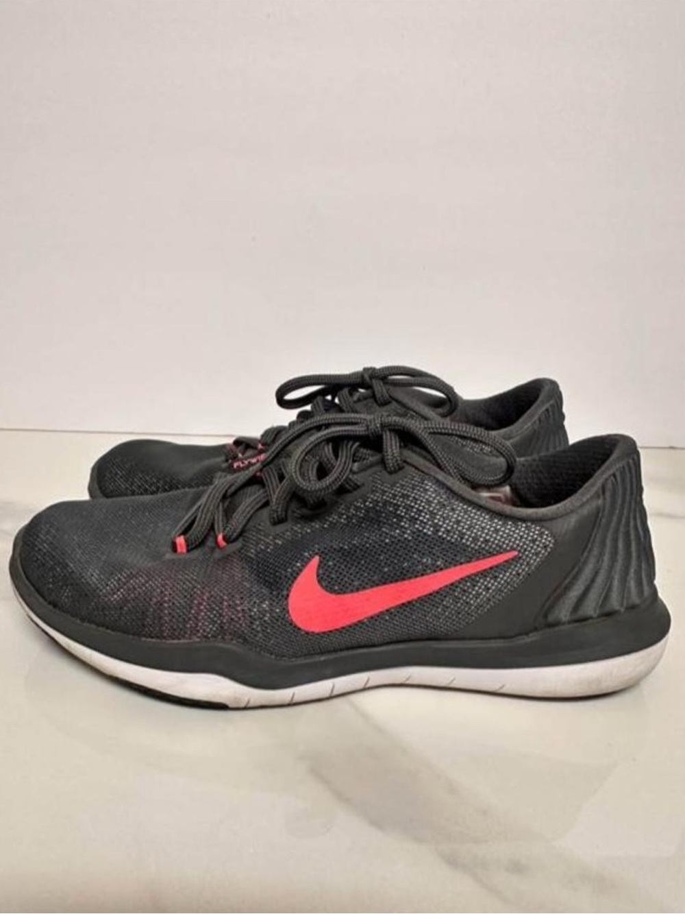 Nike Women’s Gray Running Shoes with Pink Swoosh
